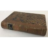 A leather-bound issue of "The Works of Shakespeare, Vol I" dated 1862.