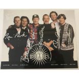 Signed colour photo of The Hollies. A promotion photo of the 1980's line up of the band.