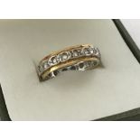 A ladies 18ct gold diamond set eternity ring.