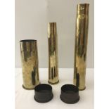 A collection of 5 items of trench art.