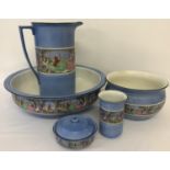 A vintage 5 piece ceramic bathroom set decorated with 18th century court scenes.