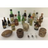 A collection of vintage glass and ceramic miniatures.