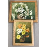 2 framed oil on boards depicting vases of flowers both signed to bottom right F. Denyer.