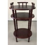 A vintage mahogany coloured 3 tier hall table.