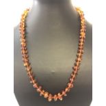 A Baltic amber necklace with screw clasp.
