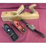 3 vintage Carpenters planes together with a Stanley spoke shave.