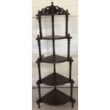 A dark wood 5 tier corner wotnot with bobbin style column detail.