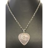 A heart shaped rose quartz pendant on a 20 inch silver belcher chain.