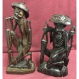 2 Chinese wooden carved figurines of oriental gentleman.