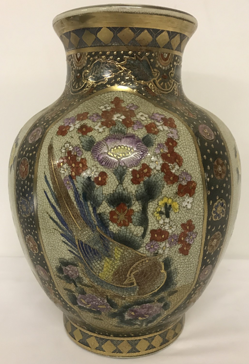 A Chinese vase with bird panel design of bulbous form.