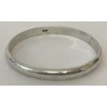 A Zambian silver bangle. Marked "KABWE Silver" to inside of bangle.