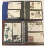 A collection of First Day Covers dating from 1960's through to 1980, in 2 large Post Office albums.