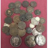 A collection of British and world coins and tokens.