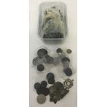 A small tub of coins and other items; metal Detector finds.