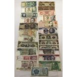 A collection of 24 South & Central American bank notes to include numerous crisp examples.