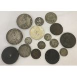 A small collection of coins and tokens.