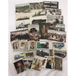 A small collection of vintage postage cards to include military and Royal, some RP's.