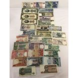 A collection of 32 South-Eastern Asian bank notes to include some crisp examples.