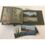 A vintage photo album in a blue cover containing views of Italy.