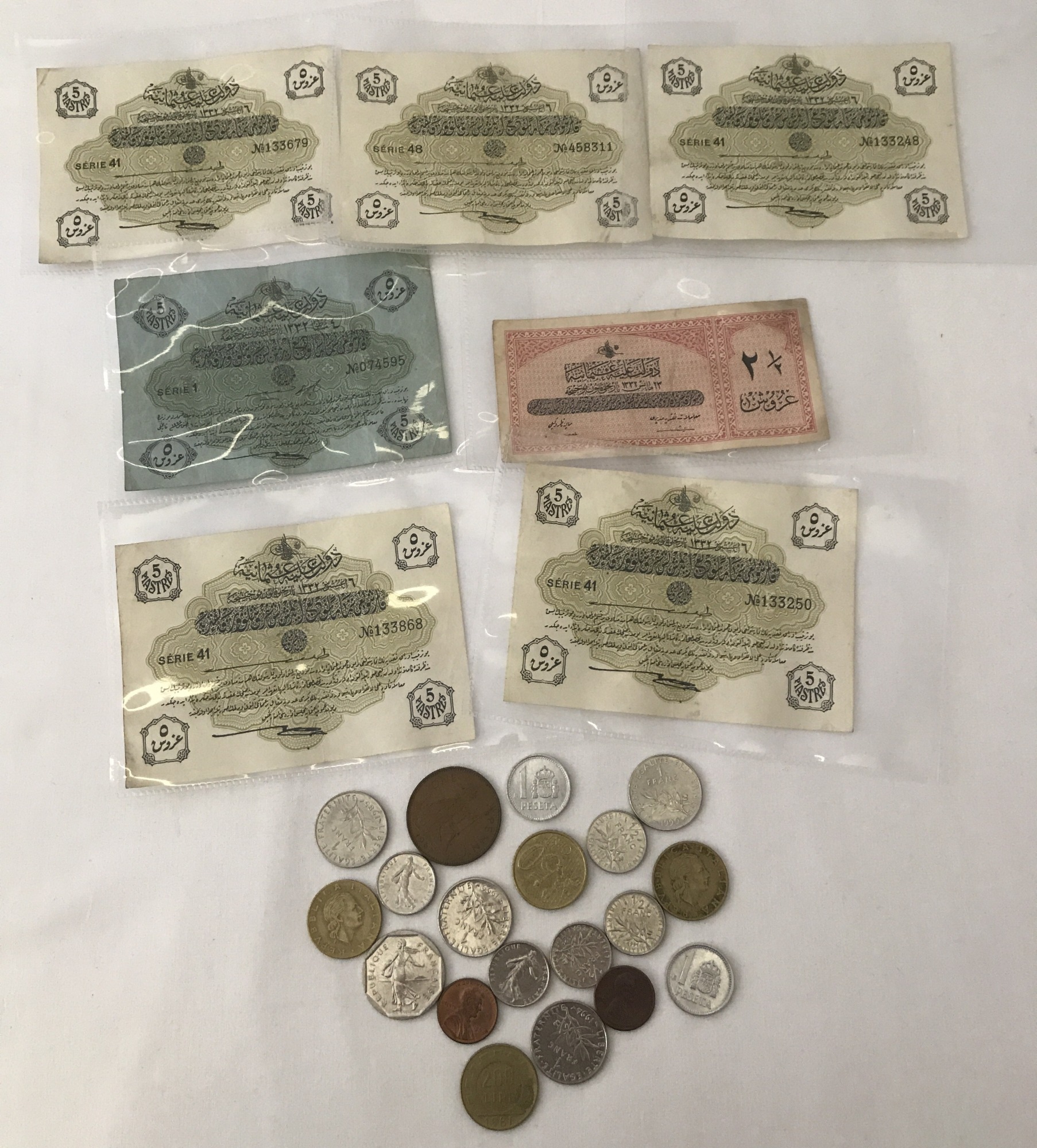 A small collection of Ottoman Turkish Piastre banknotes. Comprising a 1916 5 Piastres series 1 note.