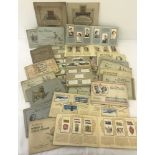 A collection of 28, circa 1930's, Wills & John Players cigarette card albums complete with contents.