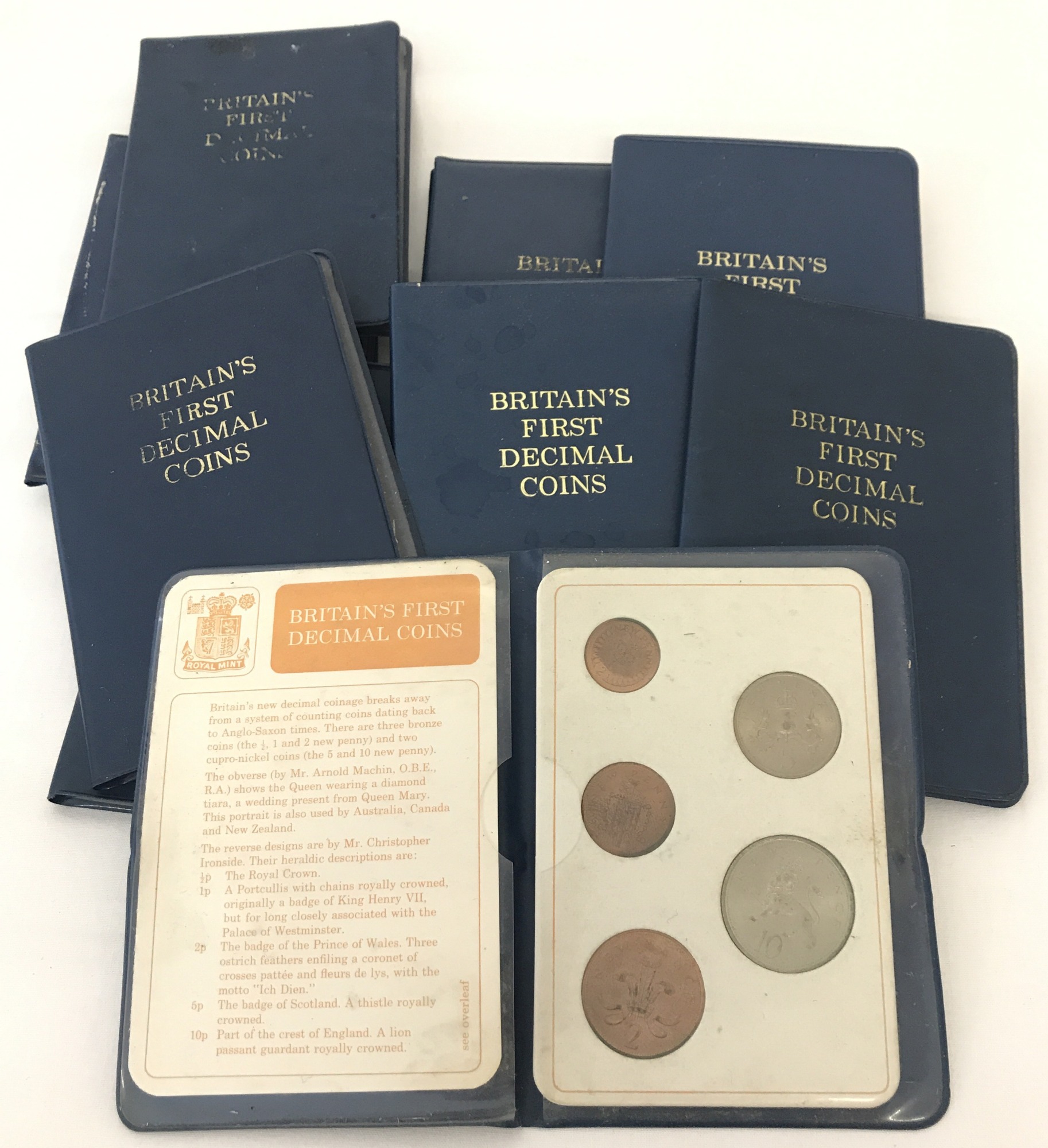 12 sets of Britain's First Decimal Coins presentation wallets.