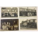 4 vintage postcards depicting shop fronts.