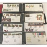 2 folders of assorted first day covers.