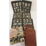 3 vintage cigarette card albums with card together with a collection of Brooke Bond tea card albums