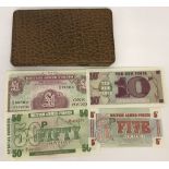 4 crisp examples of British Armed Forces bank notes together with a vintage folding note wallet.
