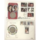 2 Elizabeth II Royal commemorative coin and stamp first day covers.