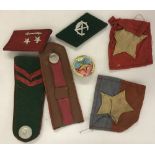 Bag of Vietnam war style badges, patches and accessories.