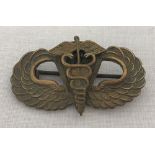 WW2 Style British made US Paratrooper wings, with a Medics badge soldered on to it.