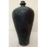 A large blue and purple glazed, slim necked vase, in the style of the Song Dynasty.