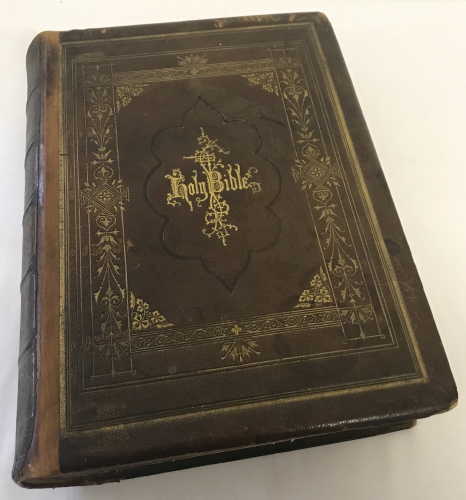 A large antique leather bound "The Universal Family Bible" Southampton: E.A. Hancock, Portswood.