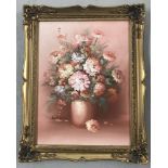K. Stone signed oil on canvas of flowers in a vase with impasto detail, in pink tones.