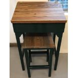 A vintage pine clerks desk and matching stool in natural wood and painted finish.