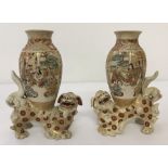 A pair of Japanese Satsuma Foo dog bud vases.