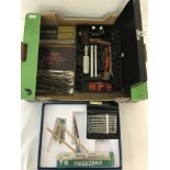 2 boxes of assorted watch making tools and equipment.