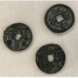 3 old Chinese coins showing figures in relief to one side.