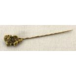 An unusual raw gold nugget stick pin.