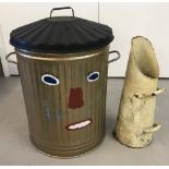 A galvanised lidded dustbin together with a vintage metal coal chute.