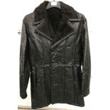 A vintage men's 3/4 length faux fur lined leather coat.