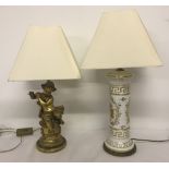 Two small table lamps in classical styles with shades.