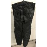 A pair of "stein" black leather motorcycle trousers.