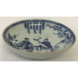 A small Chinese blue and white shallow dish with hand painted detail, possibly Ming.