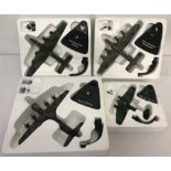 4 diecast model aeroplanes in polystyrene packing, complete with stands.