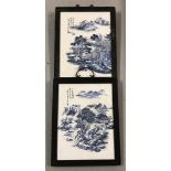 A pair of wooden framed Chinese ceramic plaques depicting Oriental mountainous scenes.
