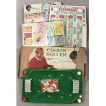 A vintage boxed Casdon Soccer Bobby Charlton game.