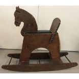 A vintage wooden rocking horse.